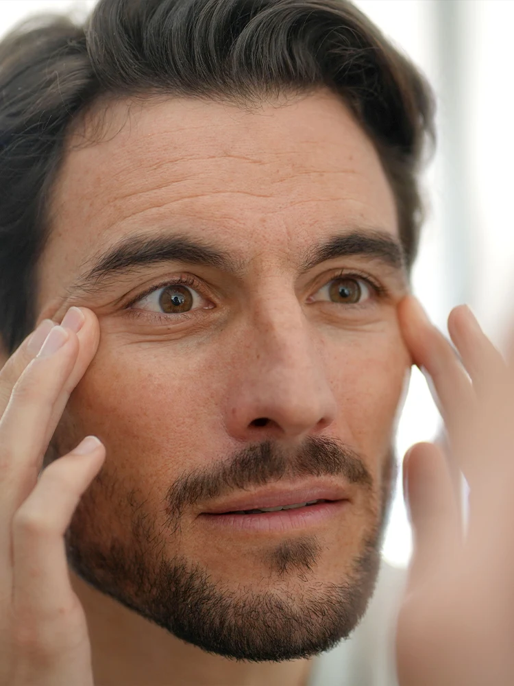 Happy patient showing natural Botox treatment benefits