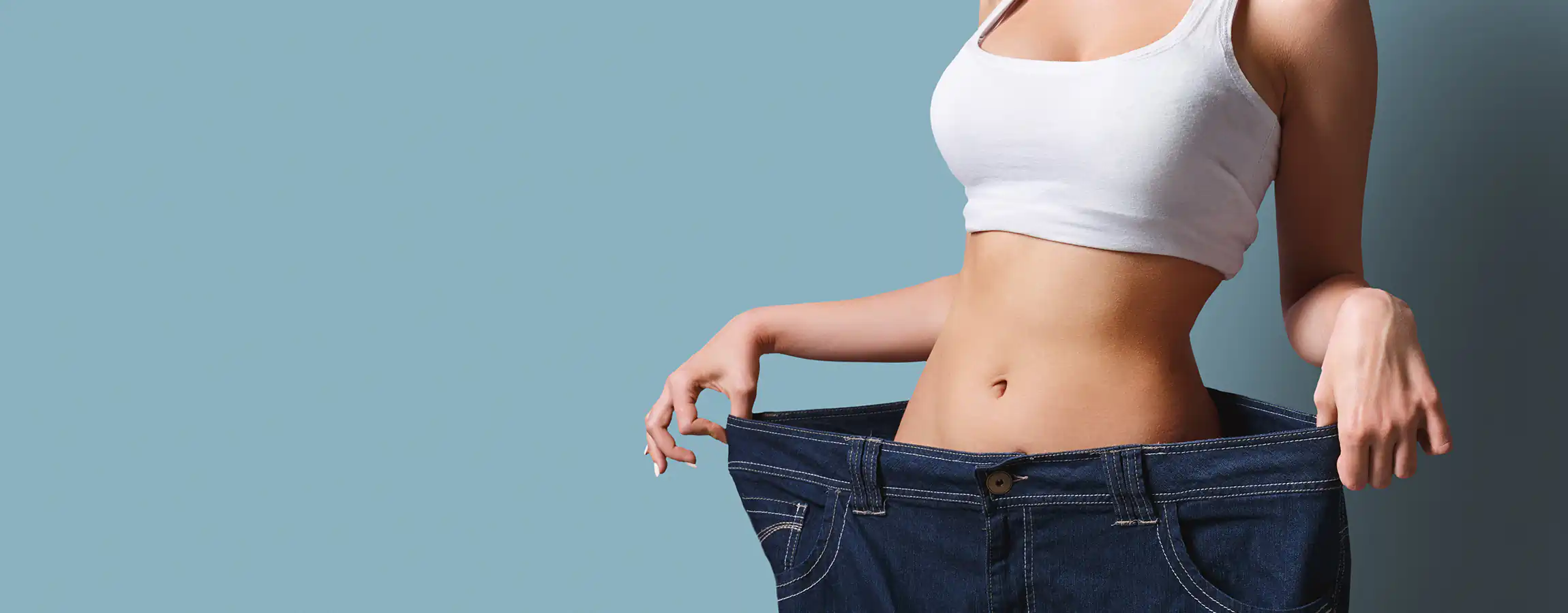 Woman displaying successful results from physician-supervised weight management in Memphis