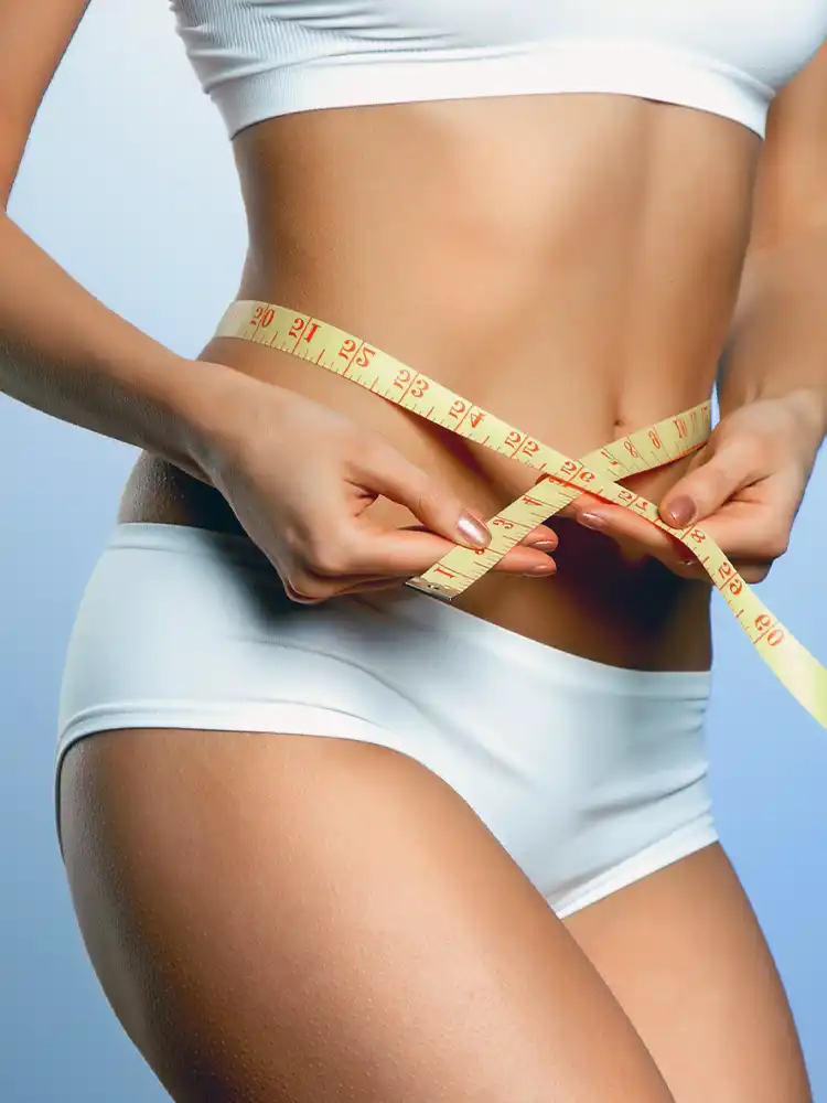 Before and after body contouring results in Memphis, TN showing dramatic abdominal transformation
